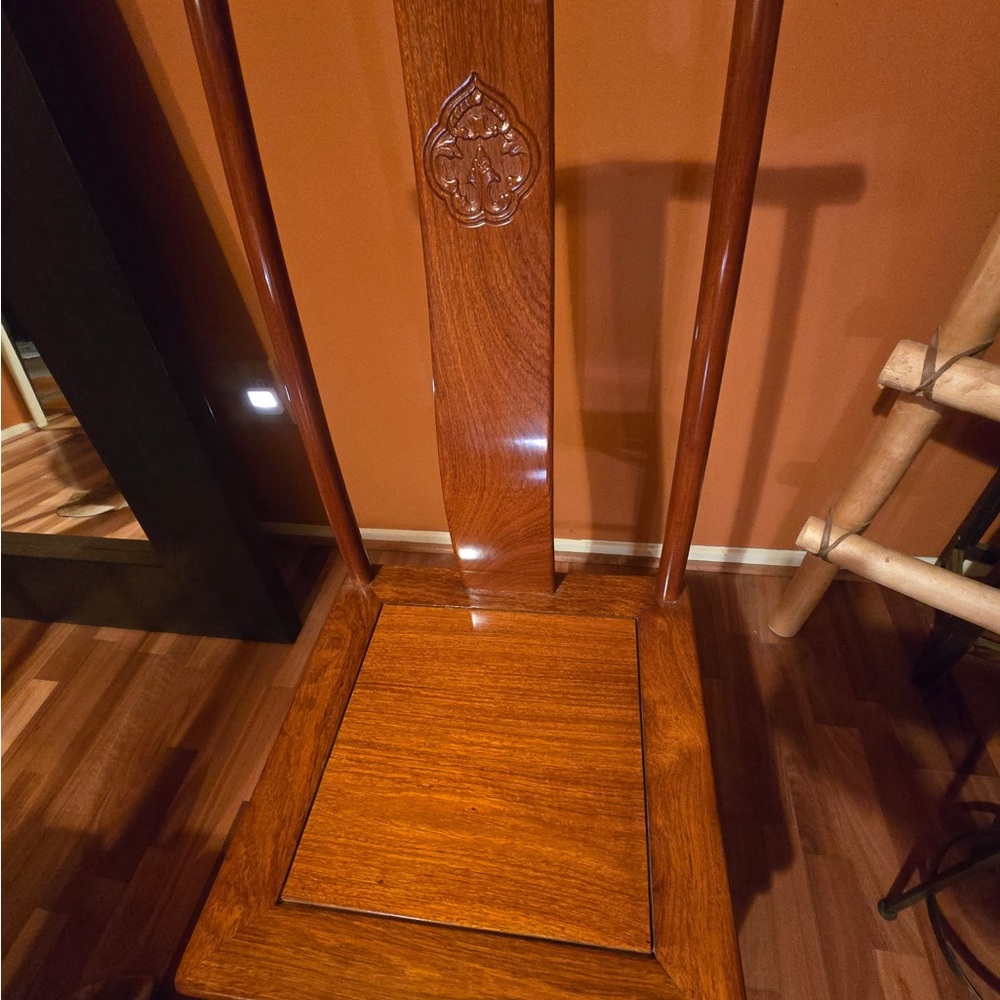 Elegant Wooden Chair with Carved Back